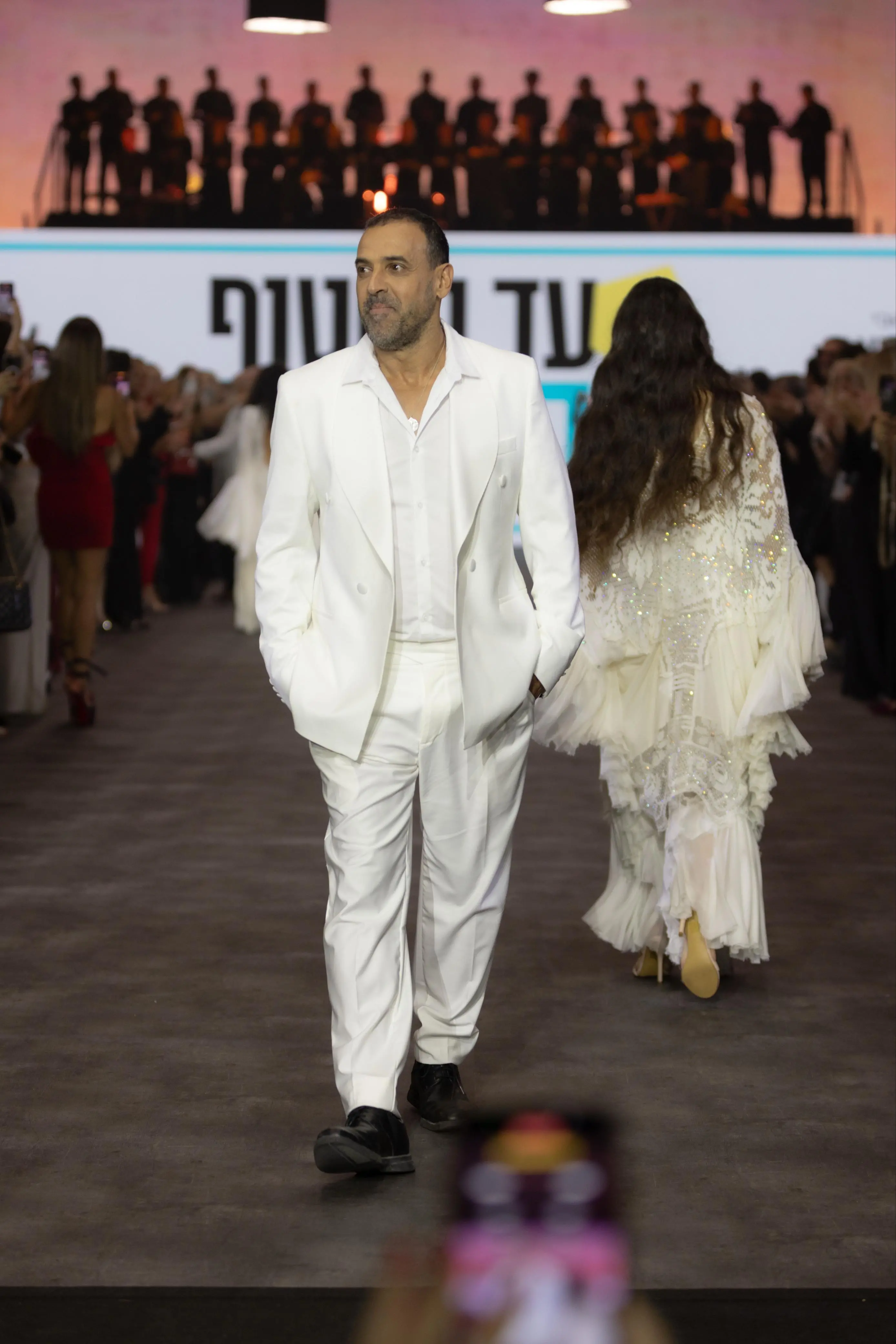 Freed hostage Eli Sharabi adds emotion to the glamour at Tel Aviv Fashion Week