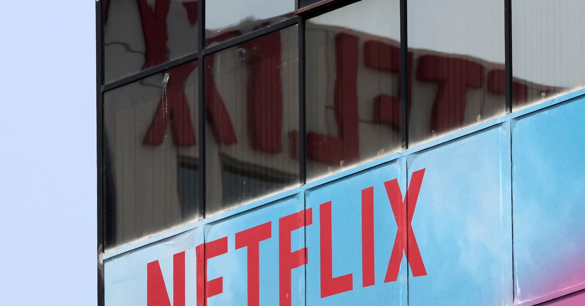 Exclusive: Netflix taps bank to explore bid for Warner Bros Discovery