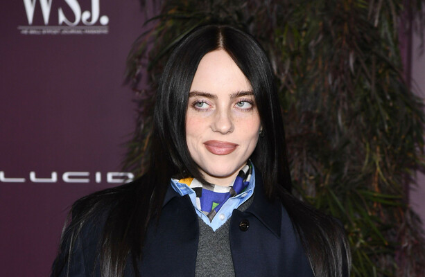 Billie Eilish accepts award from Wall Street Journal and tells billionaires: 'Give your money away'