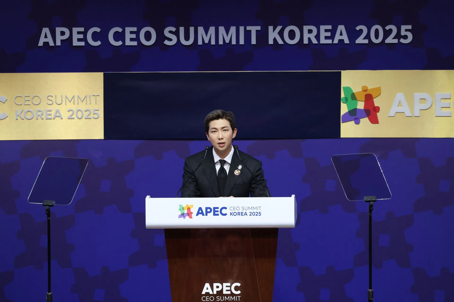 “NO ONE has done more than BTS” - Fans defend RM amid backlash over alleged “hypocrisy” claims following his APEC CEO Summit 2025 speech