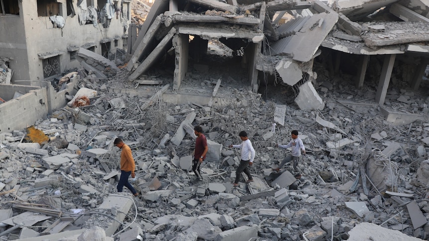 Israeli air strikes kill 104 in Gaza, Trump insists ceasefire will hold