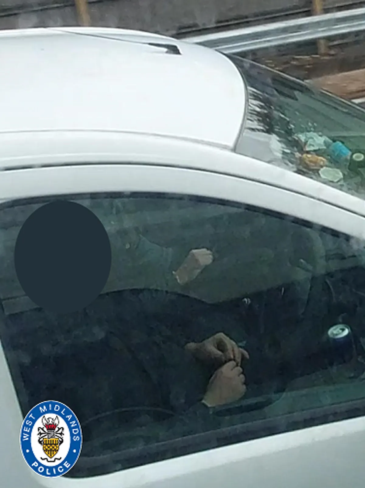Driver caught 'rolling joint' behind the wheel on M6, almost 200 stolen cars recovered and £11.9m of drugs seized in police crackdown