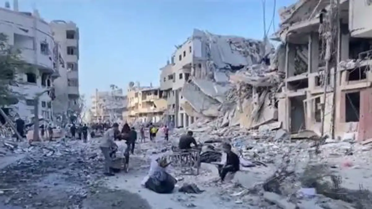 Israel’s military says ceasefire is back on as death toll from overnight strikes in Gaza reaches 104, including 46 children