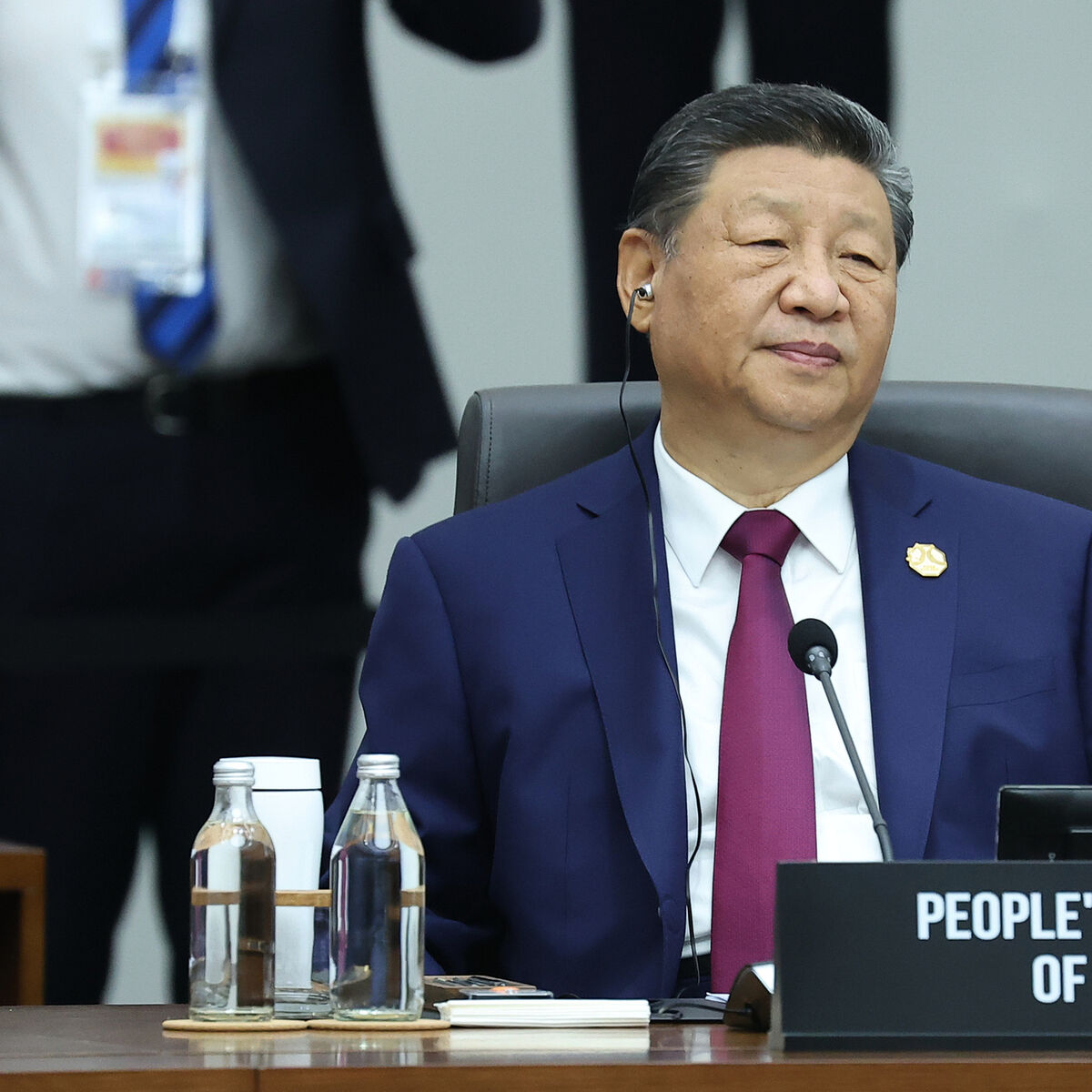 China’s Xi promises to protect free trade at Apec as Trump snubs major summit