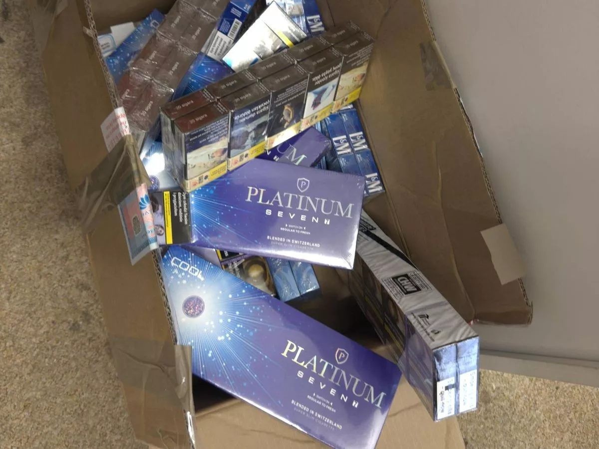 Shops found hiding illegal goods behind false wall and fridge