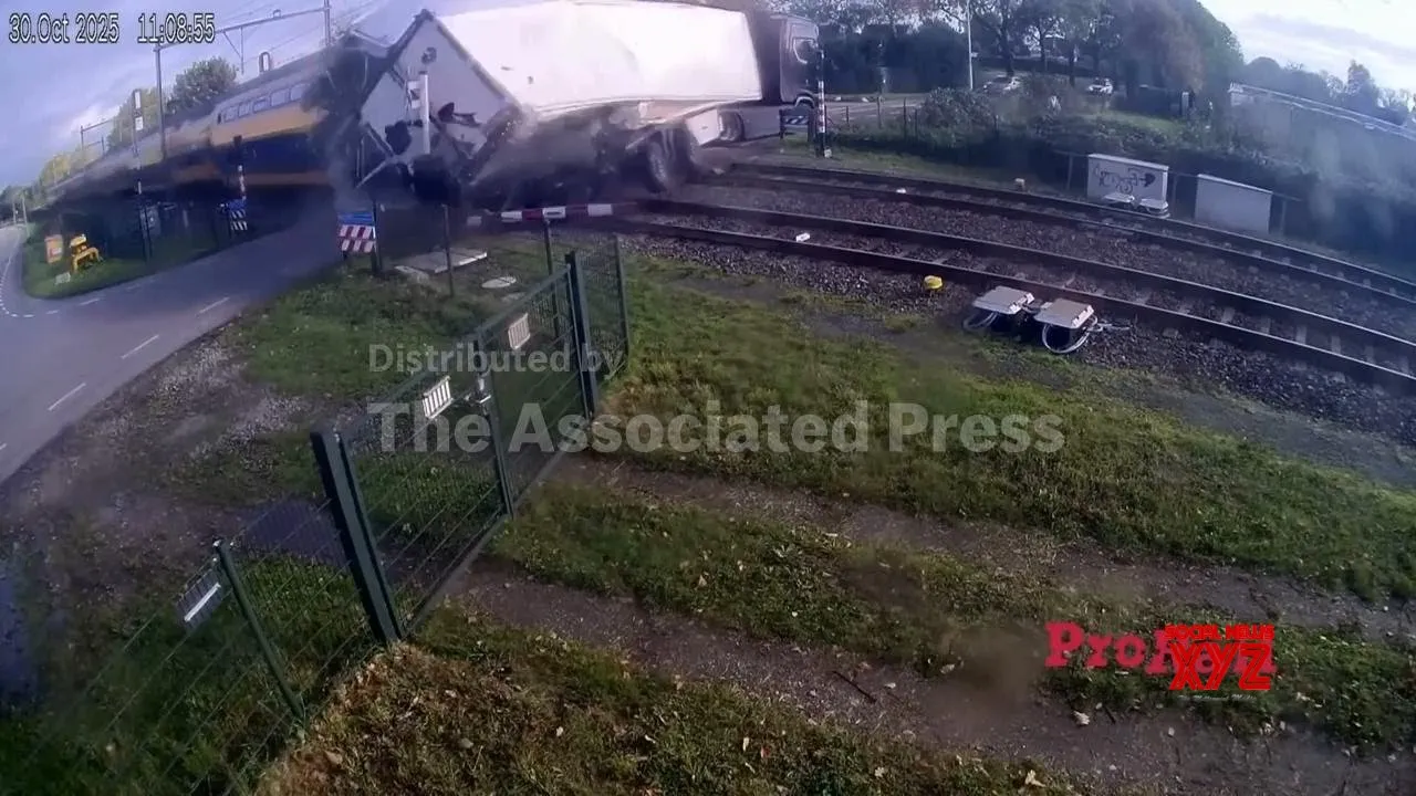 Train smashes into truck at Netherlands level crossing, injuring 5 people (Video)