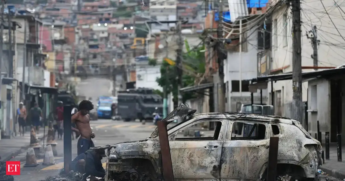 At least 64 killed in Rio police raids ahead of climate conferences