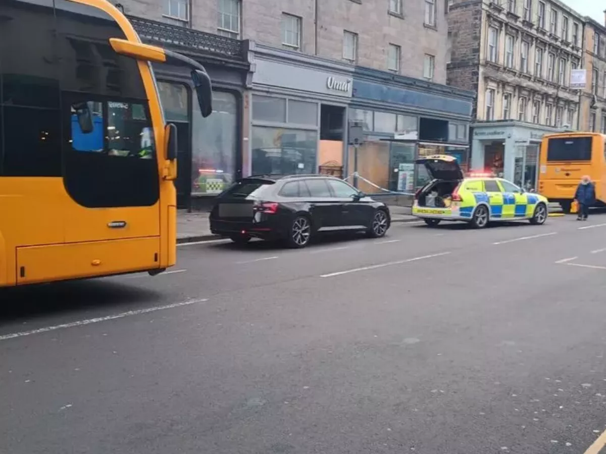 Woman rushed to hospital after being hit by bus in Edinburgh city centre