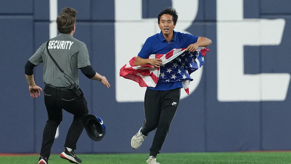 World Series fan with American flag invades field in Toronto before getting brutally tackled by security