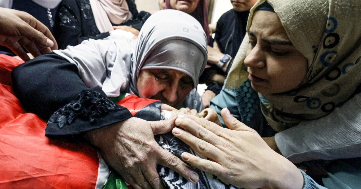 Palestinians bury 15-year-old shot by Israeli forces in West Bank