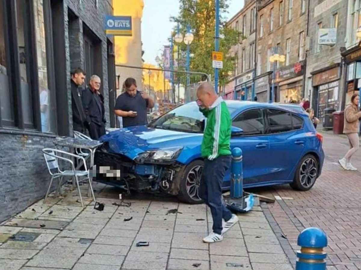 Car mounts pavement and crashes into table outside Scots restaurant