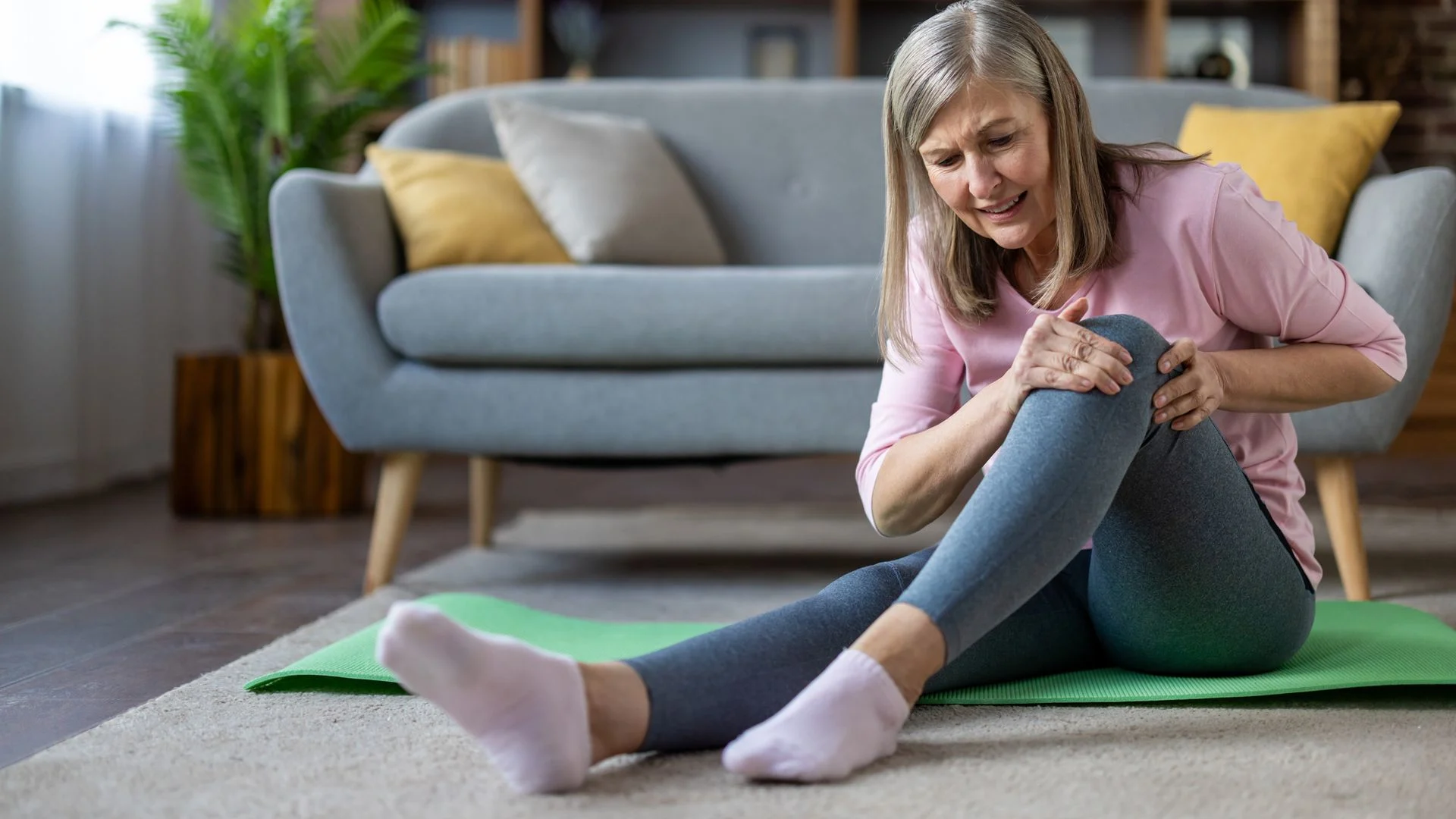 11 easy yoga stretches you can do with bad knees - and 3 you should never try