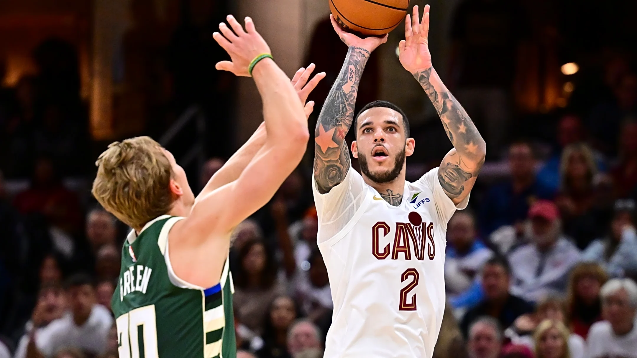 Cavs bend but don’t break, top Bucks in home opener