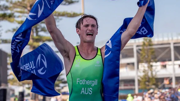 Brisbane teen dedicates world triathlon win to dad battling cancer