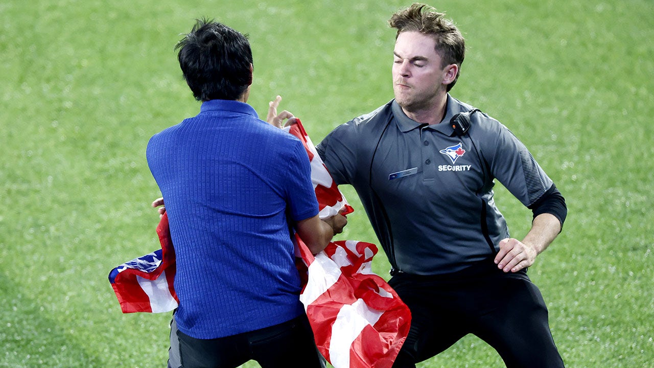 MLB news: Fan runs onto field with American flag during Dodgers-Blue Jays Game 6
