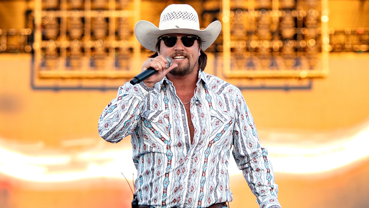 Country star Gavin Adcock falls off stage during concert
