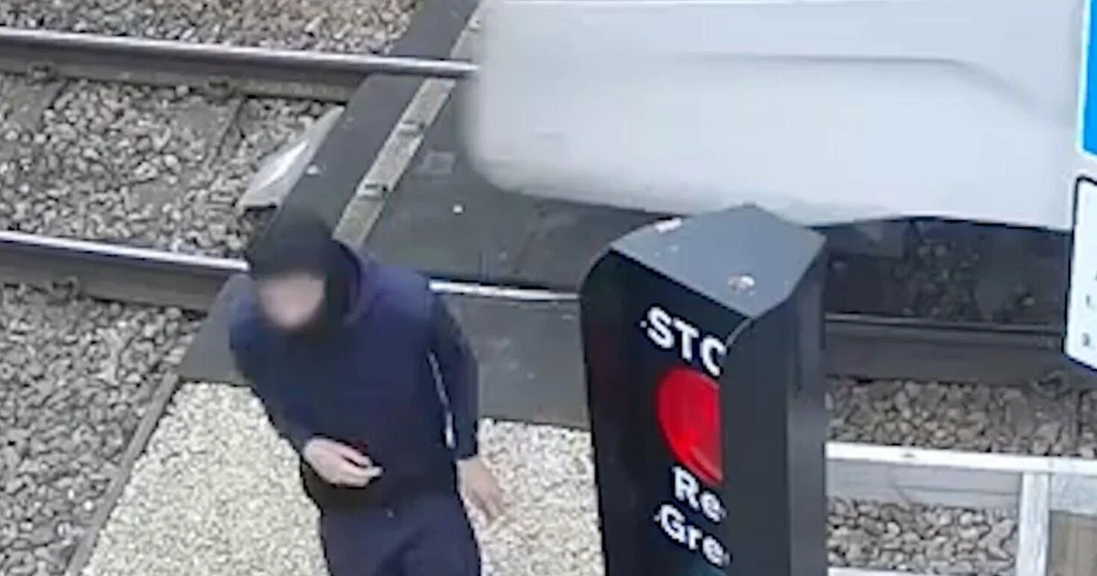 Camera catches teen playing ‘chicken’ with high-speed train