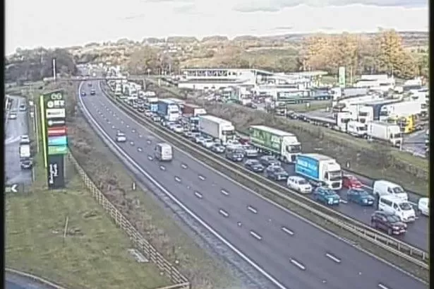 M61 LIVE 'Severe delays' and 10-mile queues as motorway blocked after crash