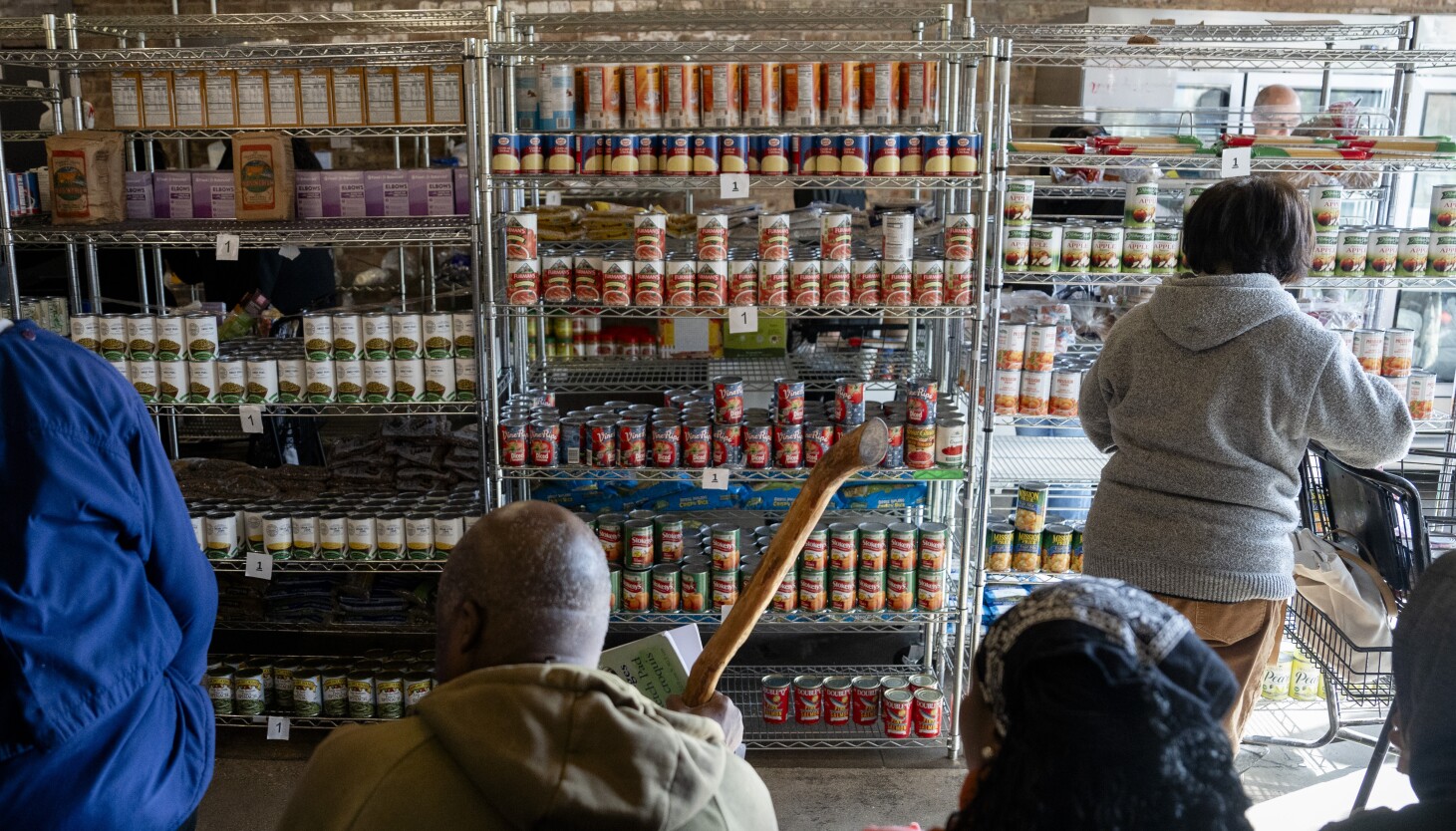 As SNAP benefits are cut off, Chicagoans who rely on food assistance line up at food pantries