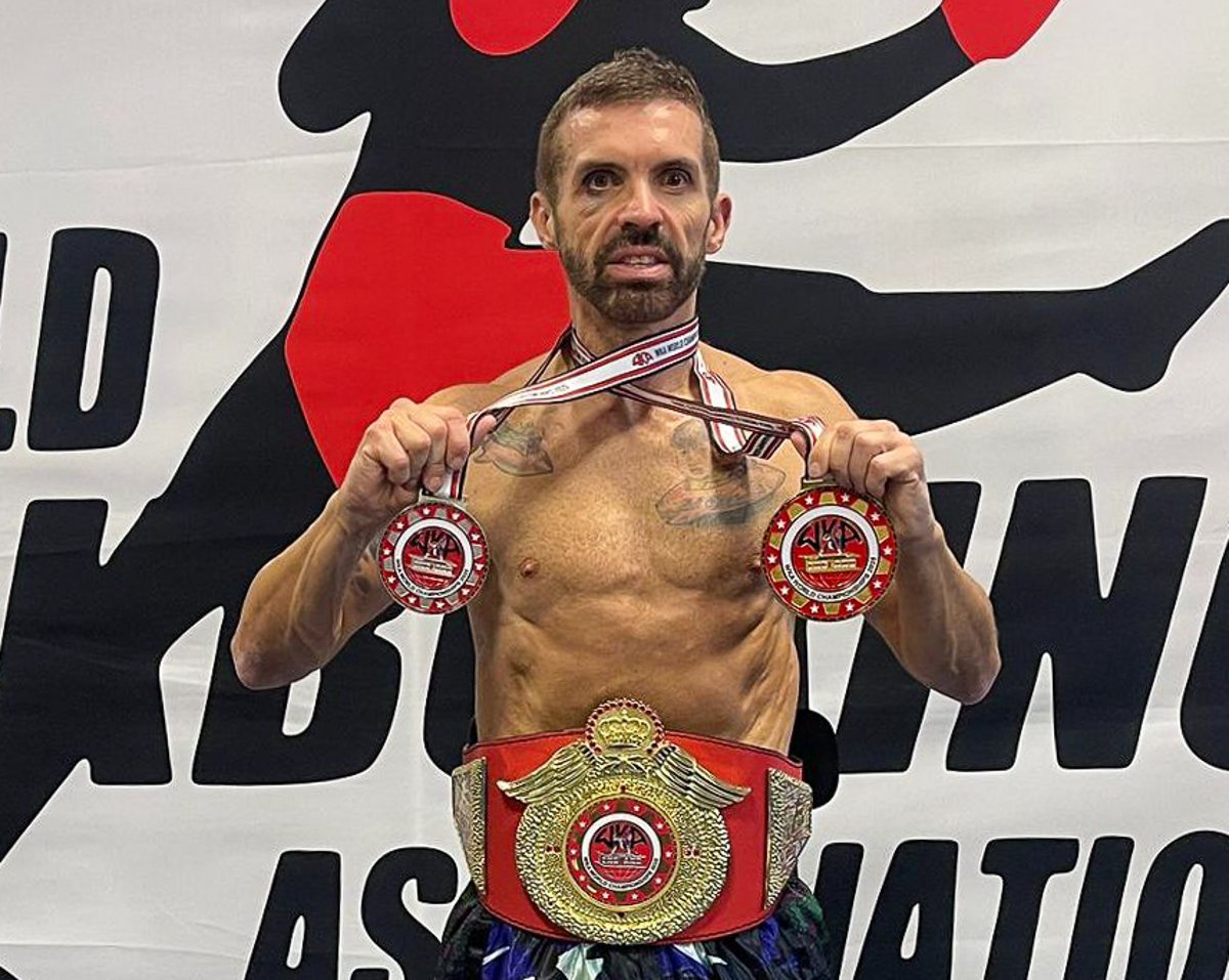 Hard as nails district joinery lecturer becomes kickboxing world champion after double medal haul