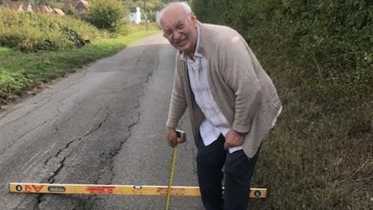 Pensioner refusers to pay his council tax in protest at a failure to fix 'dangerous hump' in his road he claims is wrecking cars