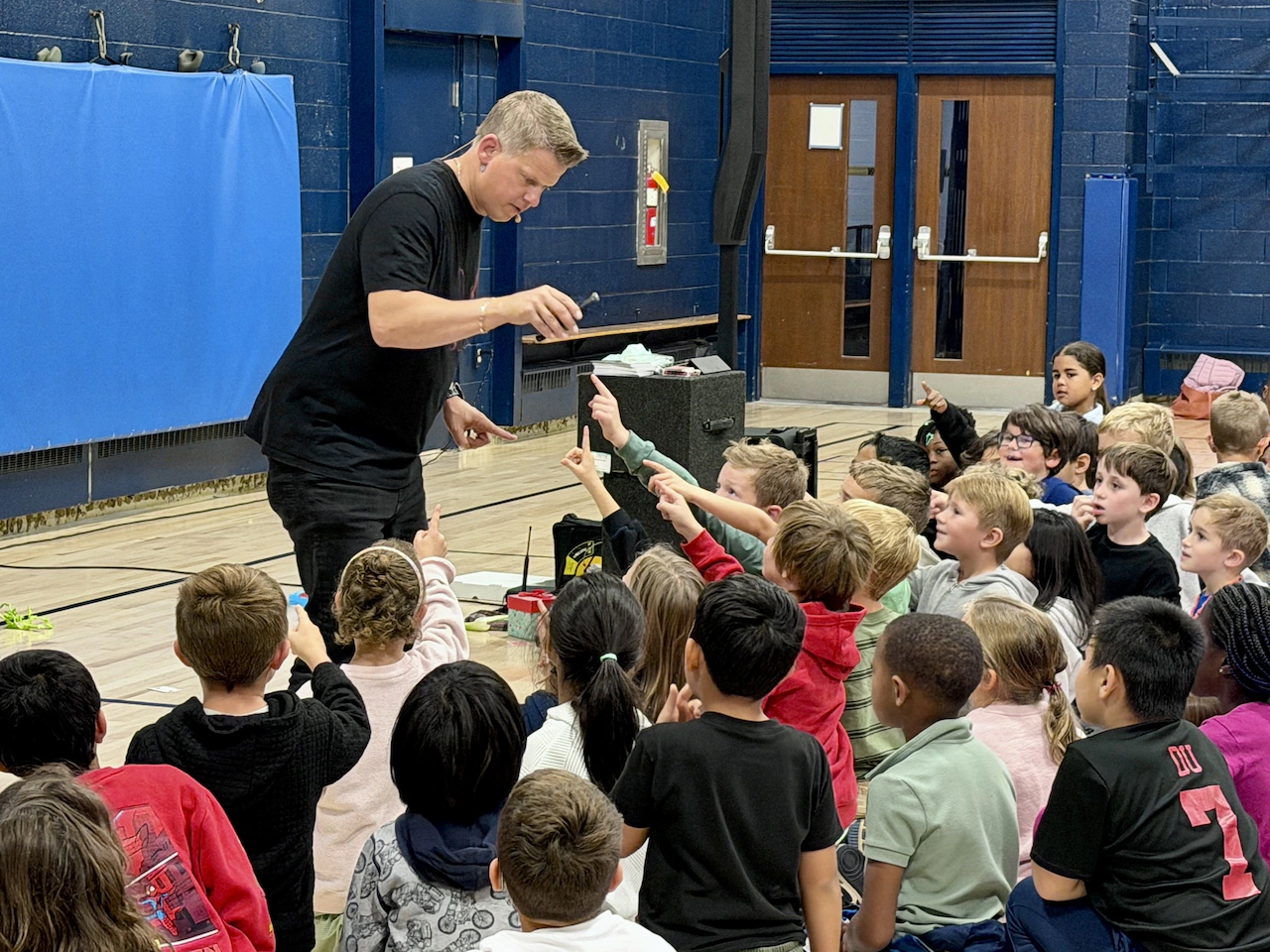 Lewis Elementary students treated to a magical surprise with performance by Rick Smith Jr.