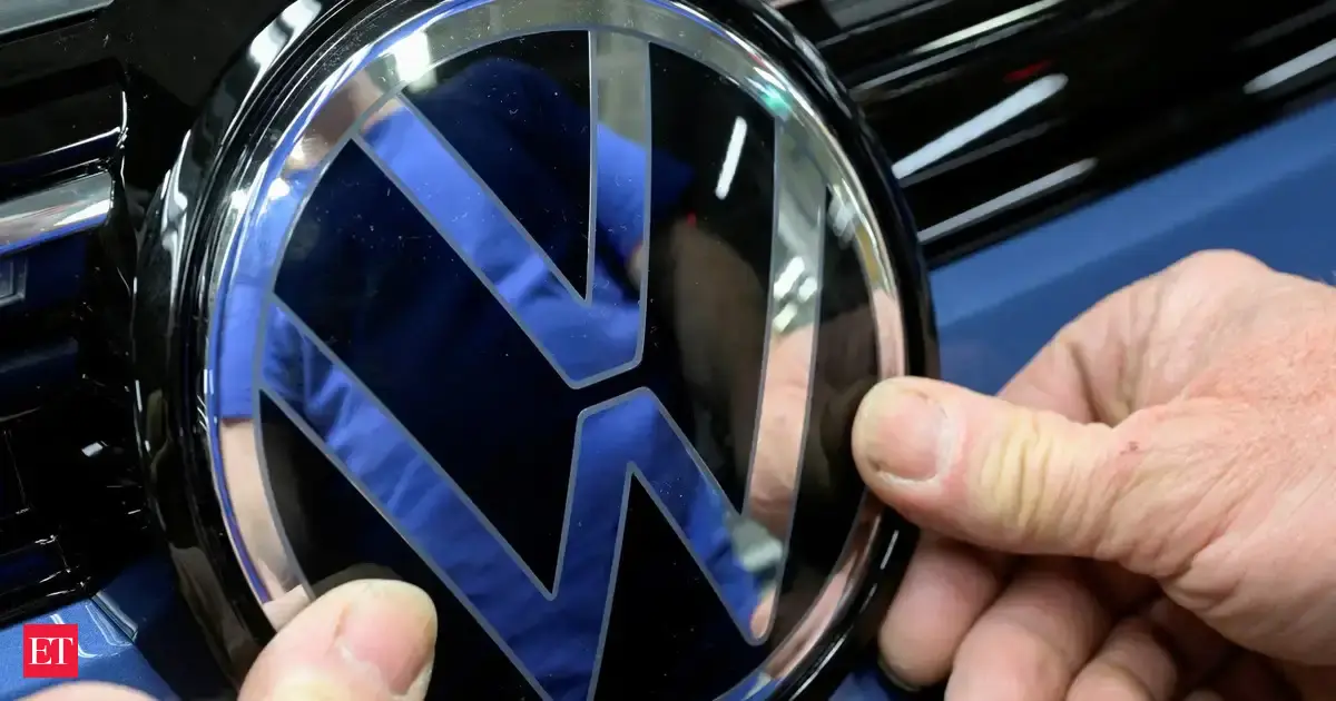 Volkswagen swings to 1.3-billion euro loss in Q3 on tariff, Porsche woes