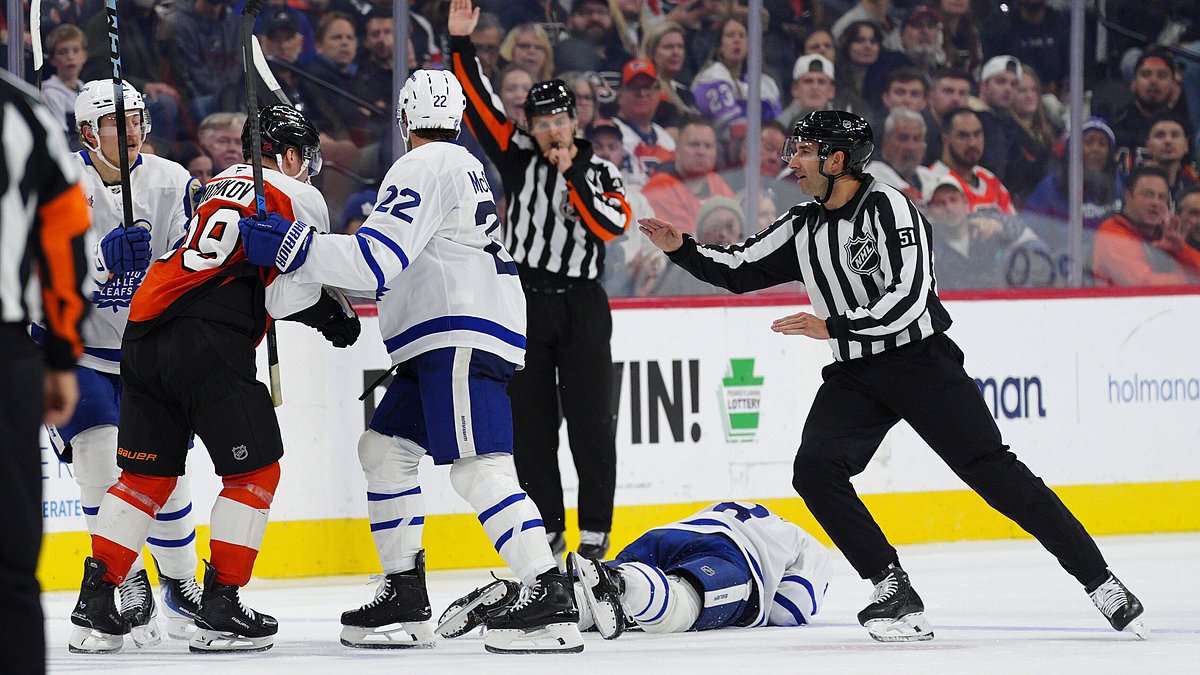 NHL star Chris Tanev taken to the hospital after getting blindsided by Flyers rival Matvei Michkov