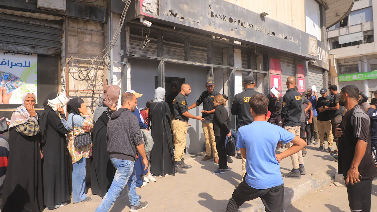 2 bank branches partially reopen in Gaza — without cash