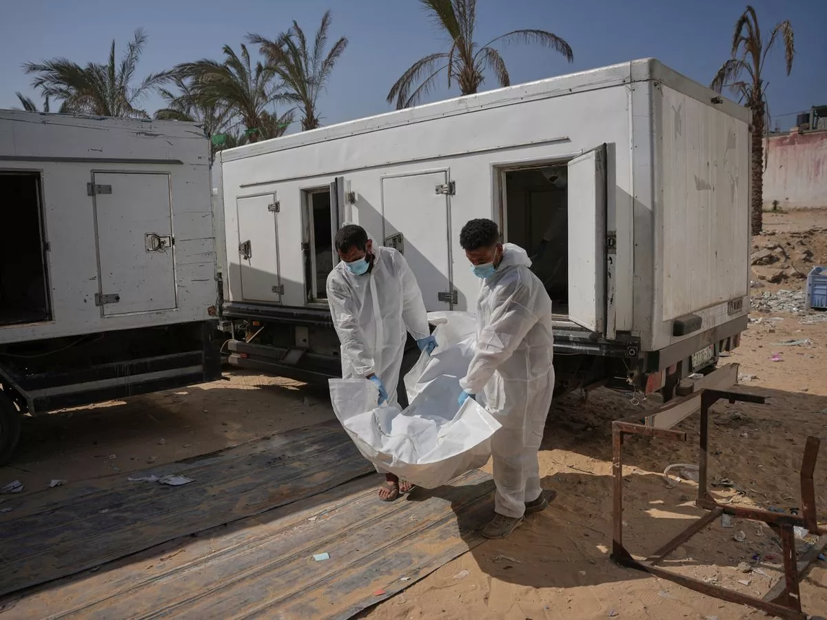 Gaza ceasefire 'holds' as bodies exchanged between Israelis and Palestinians