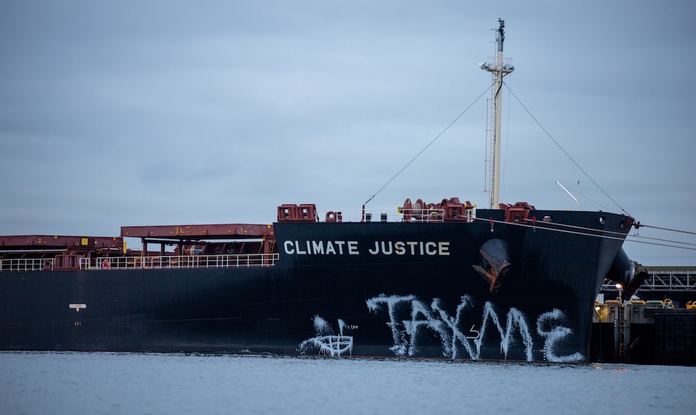 ‘Tax Me’ protest targets coal ship named Climate Justice in Newcastle