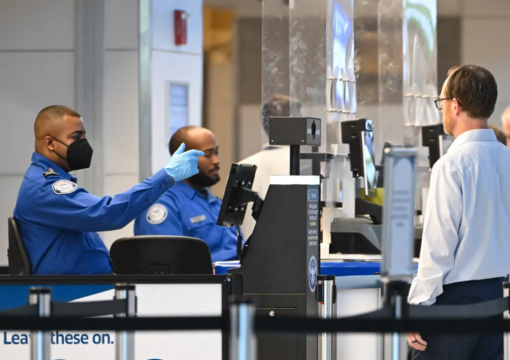 Thousands of airport workers on the job without pay