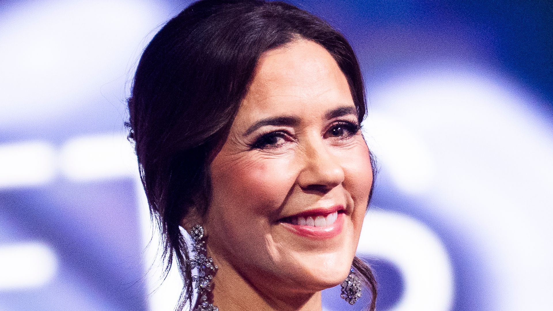 Queen Mary is a fashion spectacle in cut-out pencil skirt – and glitter heels