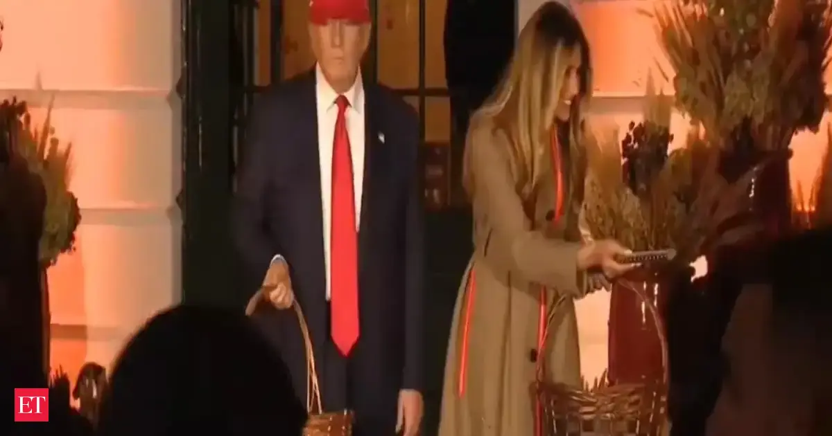 Halloween at White House: Mini Trump, Melania and party pooper steal the spotlight as President hosts trick-or-treaters