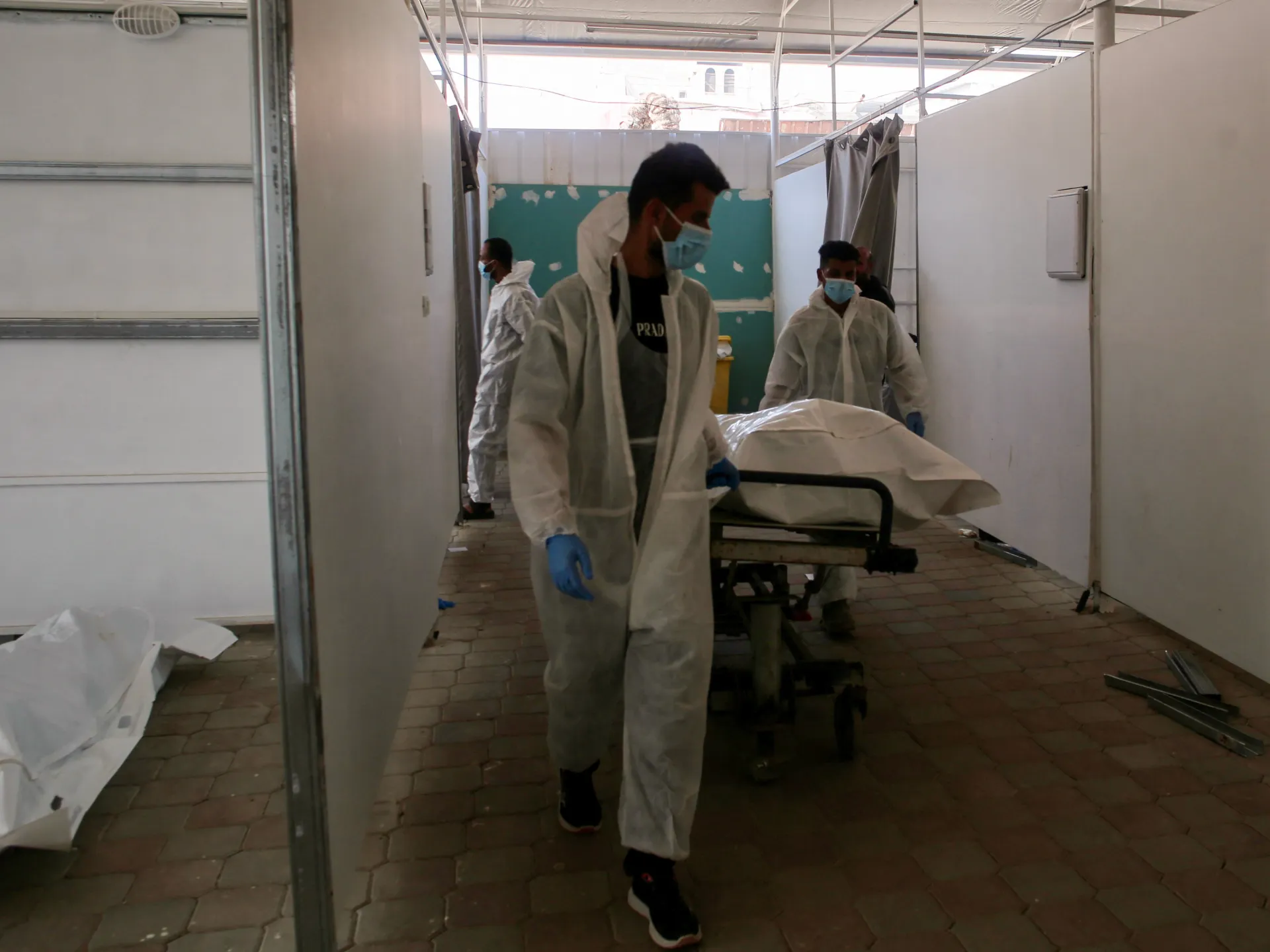 Israel returns 30 bodies of slain Palestinians as new strikes hit Gaza