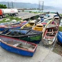 Fishing boats are tied together in preparation for the arrival of Hurricane Melissa near the fishing village of Rae Town, East Kingston, Jamaica