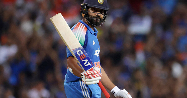 Rohit signs fan's jersey after arriving in Mumbai following memorable ODI series in Australia
