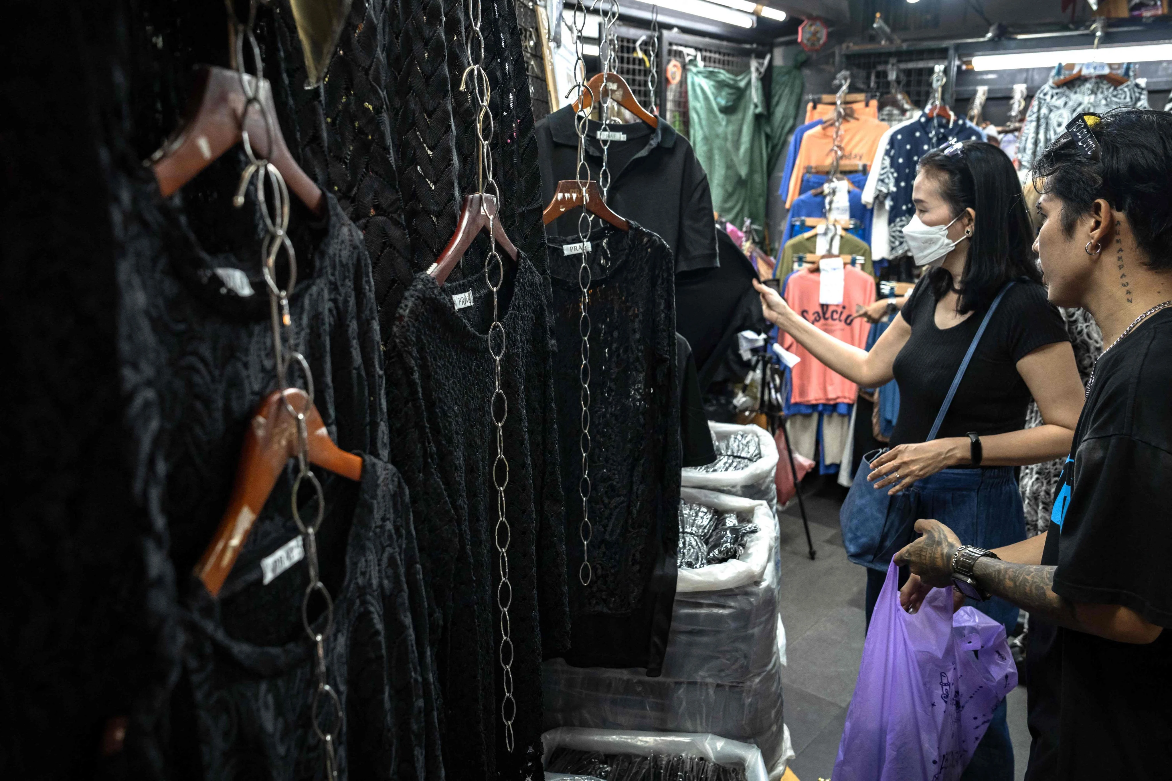 Fade to black: Thai vendors go in the red to sell mourning clothes