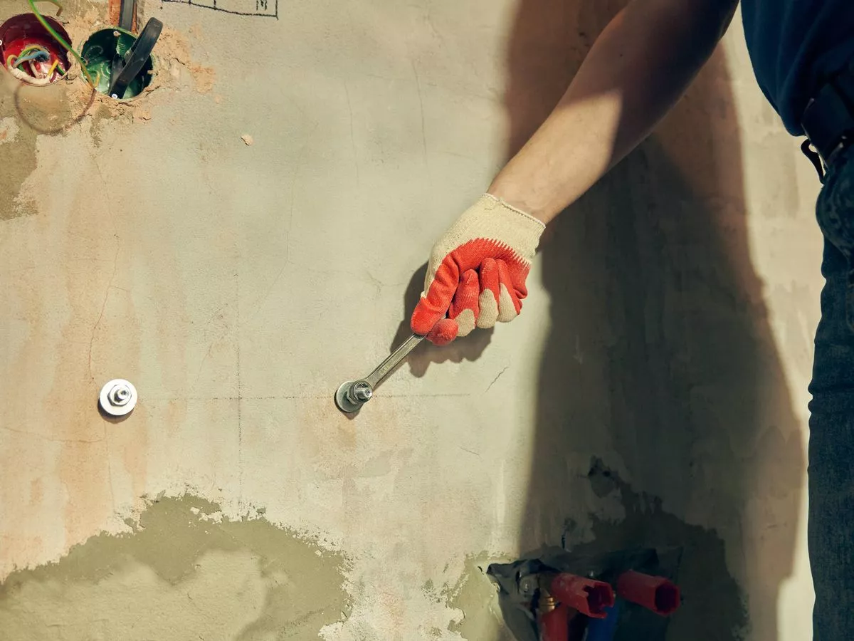 Man knocks bathroom wall down while wife is away and everyone has same response