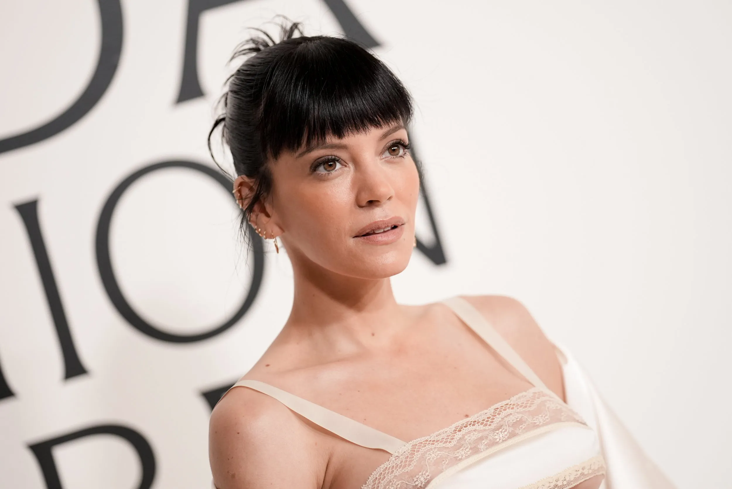 Lily Allen embraces her power in risqué red carpet look as West End Girl storms charts