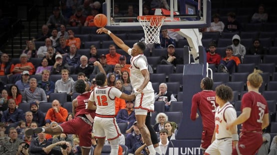 A UVA Basketball team winning with defense