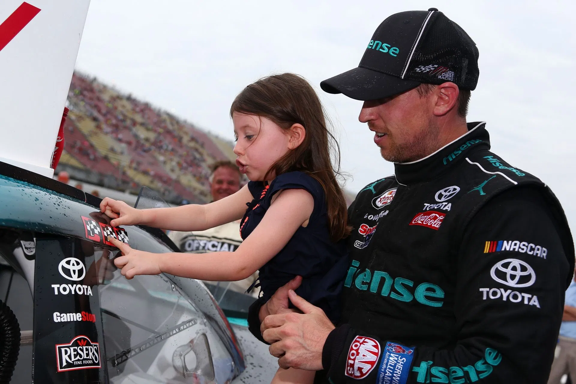What message did Denny Hamlin give to his two daughters crying over his NASCAR championship loss