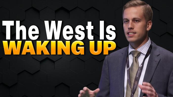 The East Is Buying Gold. The West Is Buying Time.