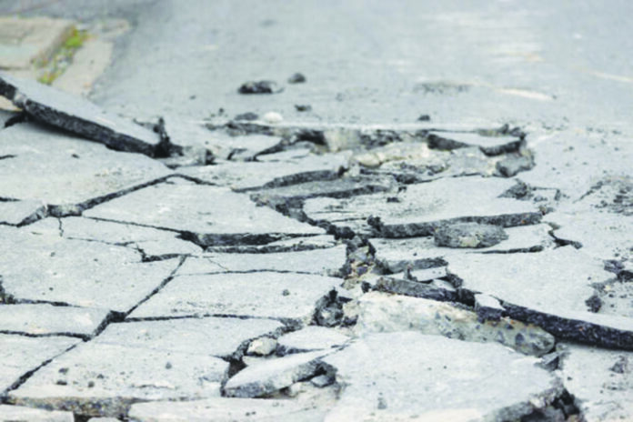 The silence beneath cracking concrete