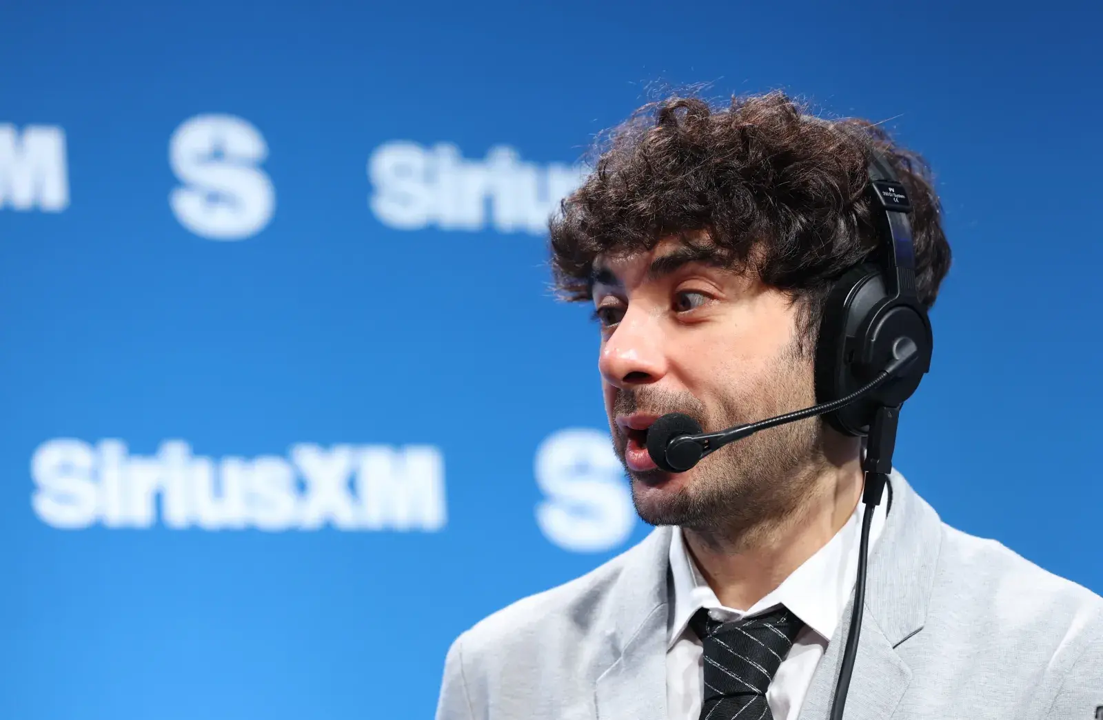 Exclusive: Tony Khan Talks Cody Rhodes and CM Punk in AEW Book, Blood &amp;amp; Guts, and Full Gear 2025