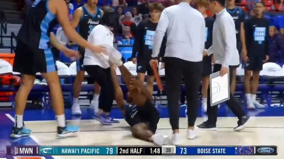 Wild moment injured Hawaii Pacific college basketball player gets brutally dragged off the court by trainers