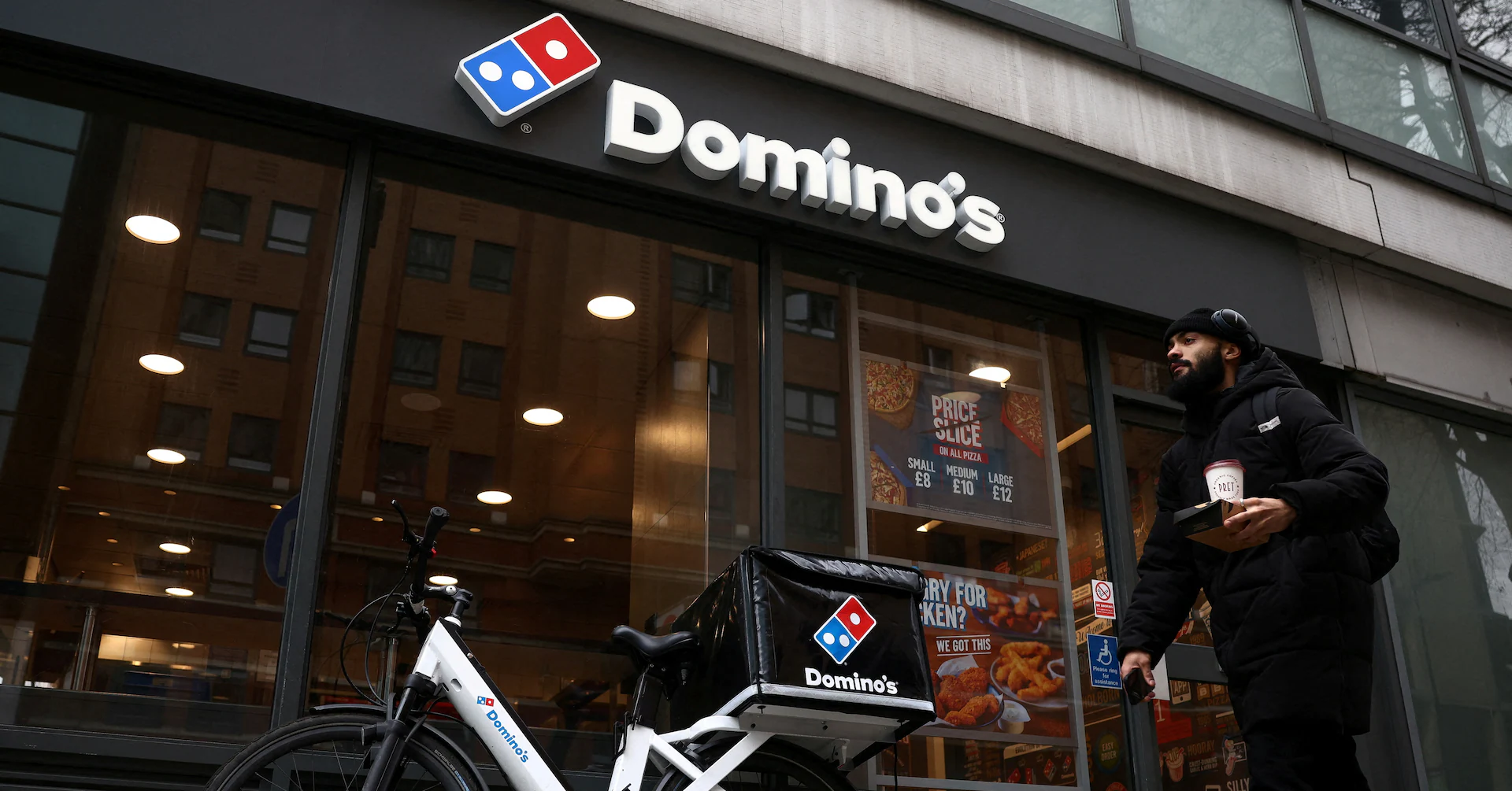 UK's Domino's Pizza logs like-for-like sales growth in tough market