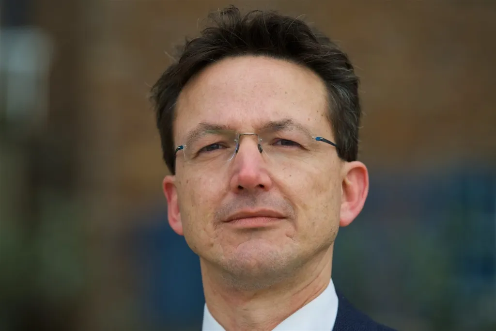 Funding cuts to seven public bodies to keep Economy on budget