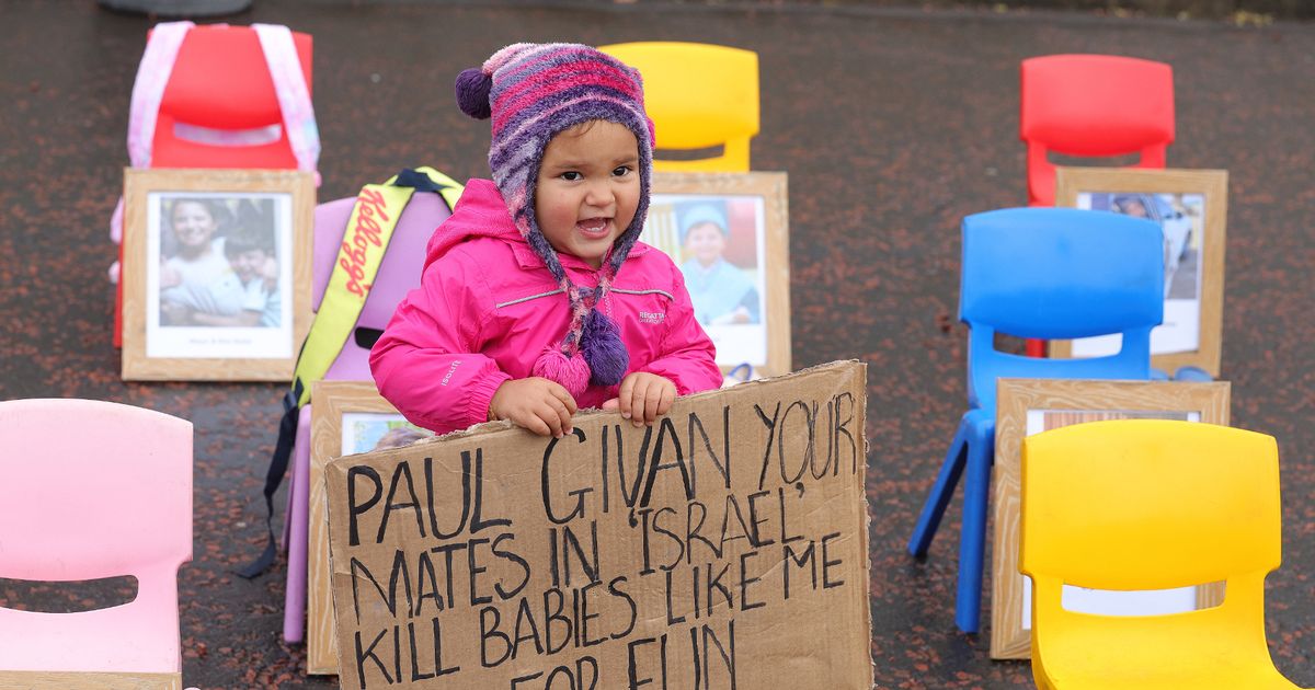 Protesters gather at Stormont to call for Paul Givan's resignation