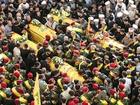 Hundreds in south Lebanon mourn Hezbollah members killed in Israeli attacks